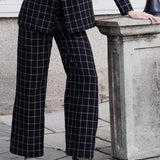 Pantalon à carreaux noir Selena